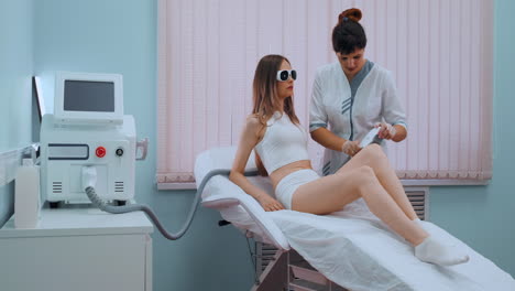 Laser-epilation-and-cosmetology.-Hair-removal-cosmetology-procedure.-Laser-epilation-and-cosmetology.-Cosmetology-and-SPA-concept.